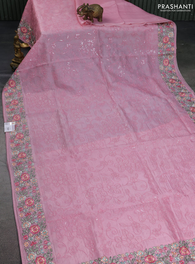 Pure organza silk saree light pink with allover embroidery and floral embroidery border