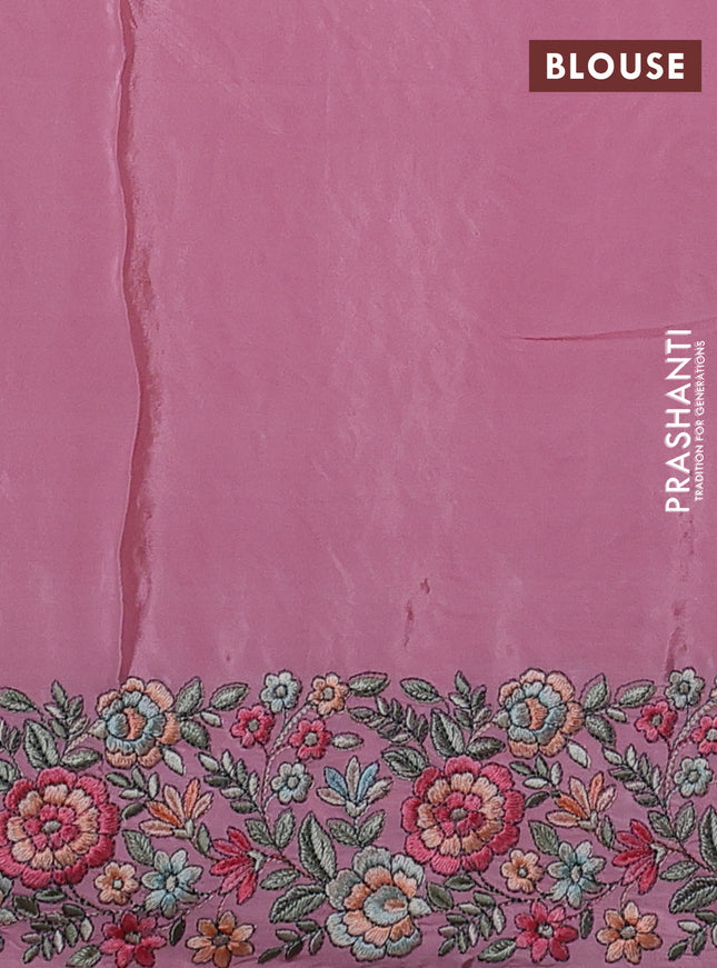 Pure organza silk saree light pink with allover embroidery and floral embroidery border