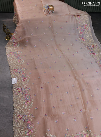 Pure organza silk saree sandal with floral embroidery buttas and floral embroidery border