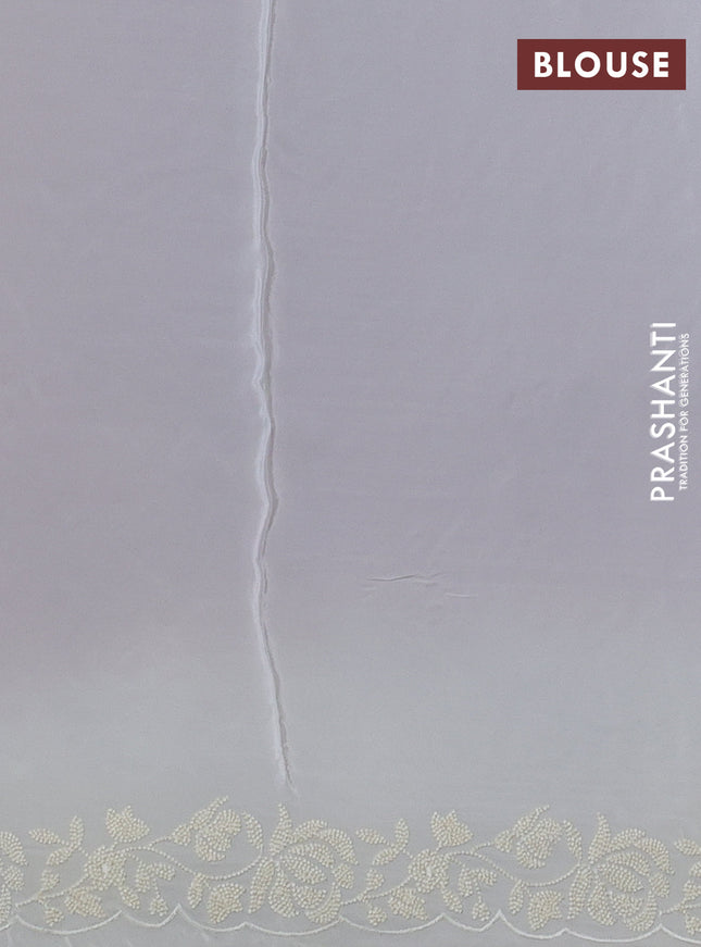 Pure organza silk saree brown shade and cream with allover floral embroidery