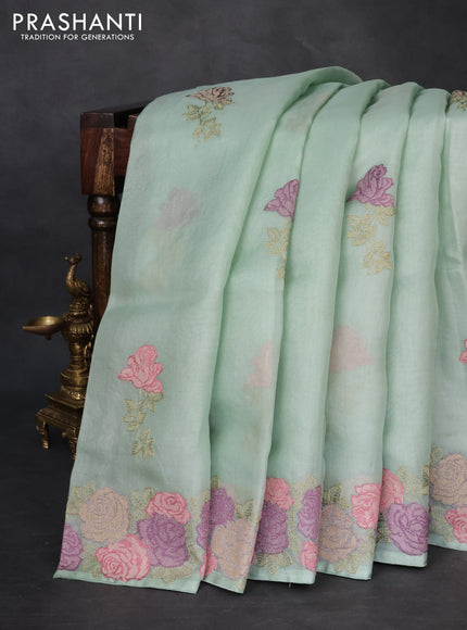 Pure organza silk saree pastel green with floral embroidery buttas and floral embroidery border