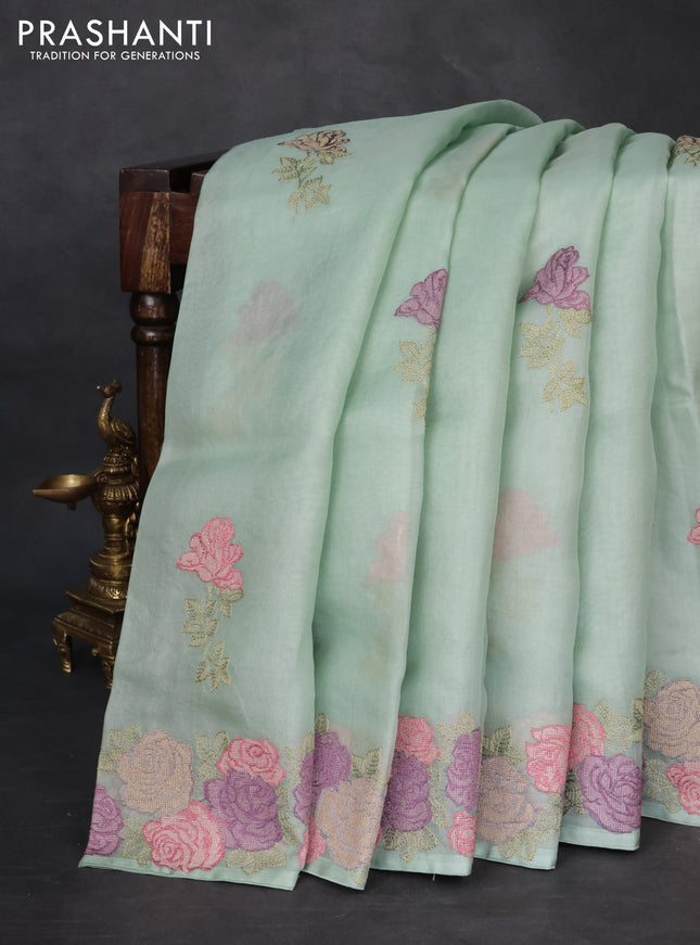 Pure organza silk saree pastel green with floral embroidery buttas and floral embroidery border