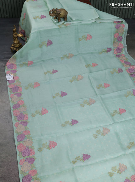 Pure organza silk saree pastel green with floral embroidery buttas and floral embroidery border