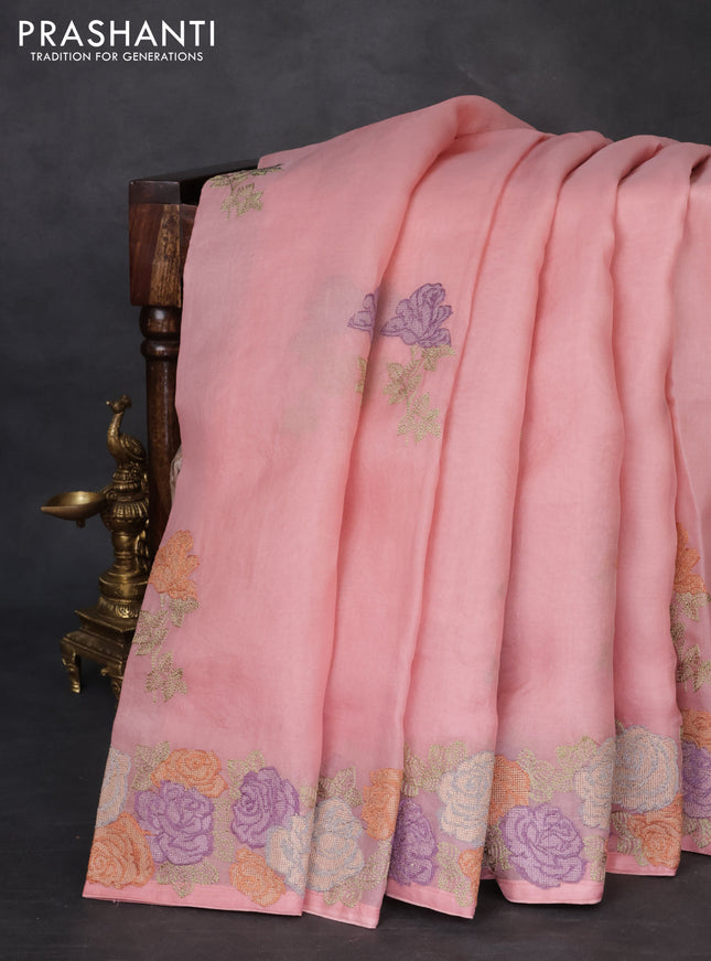 Pure organza silk saree peach shade with floral embroidery buttas and floral embroidery border