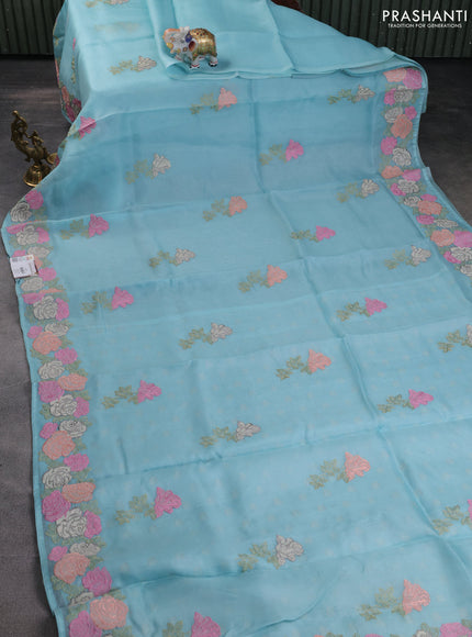 Pure organza silk saree light blue with floral embroidery buttas and floral embroidery border