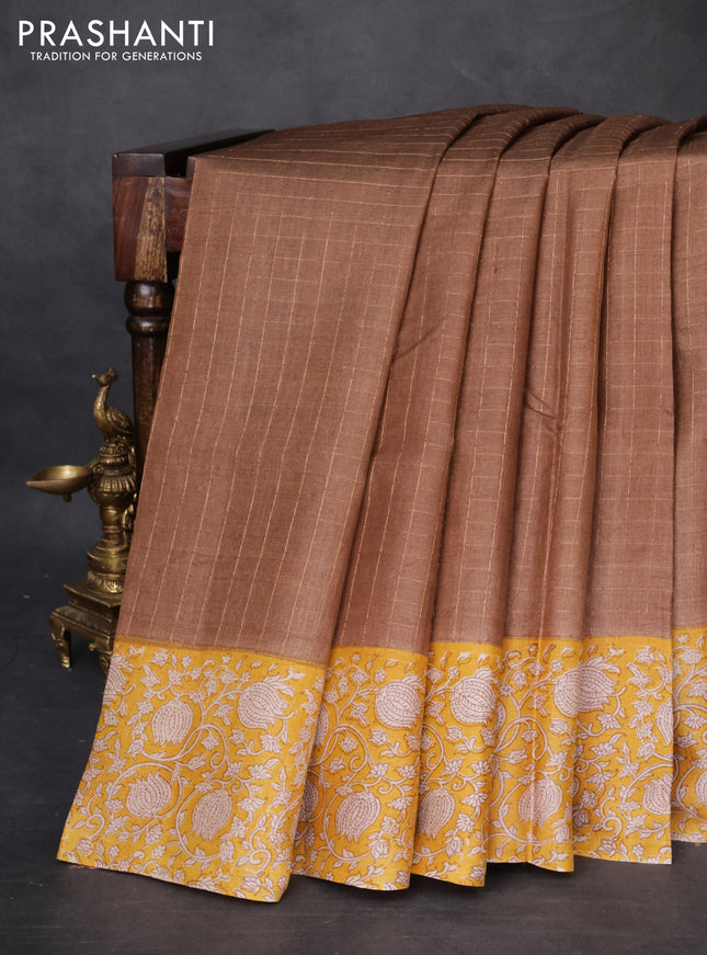 Pure tussar silk saree brown and yellow with allover zari checked pattern and kalamkari printed border