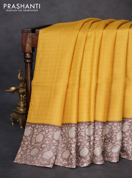 Pure tussar silk saree mustard yellow and brown with allover zari checked pattern and kalamkari printed border