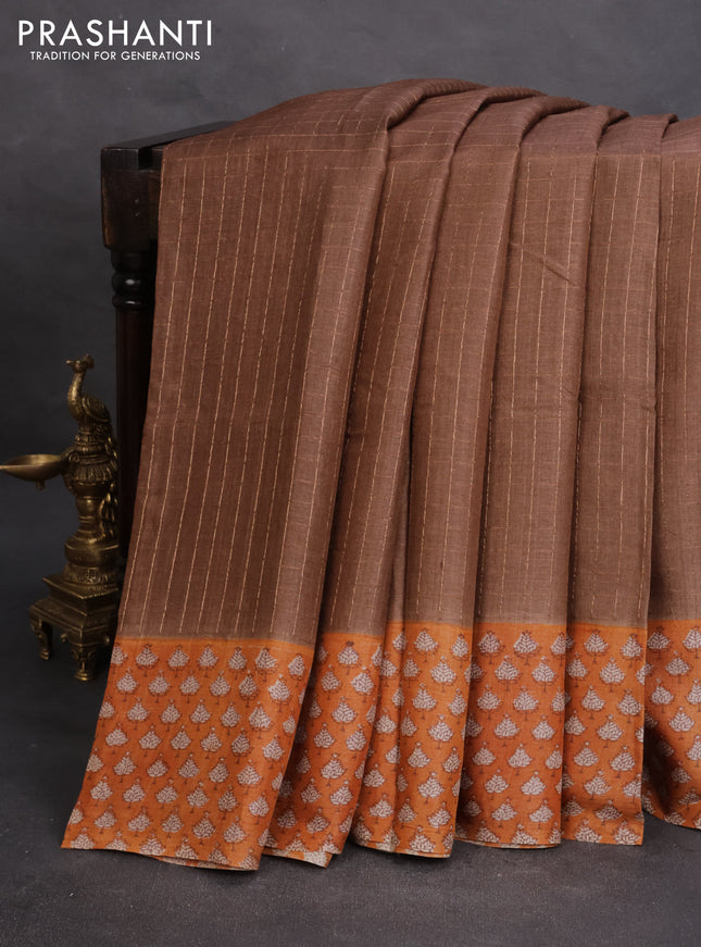 Pure tussar silk saree brown and pale orange with allover zari checked pattern and printed border