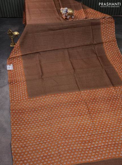 Pure tussar silk saree brown and pale orange with allover zari checked pattern and printed border