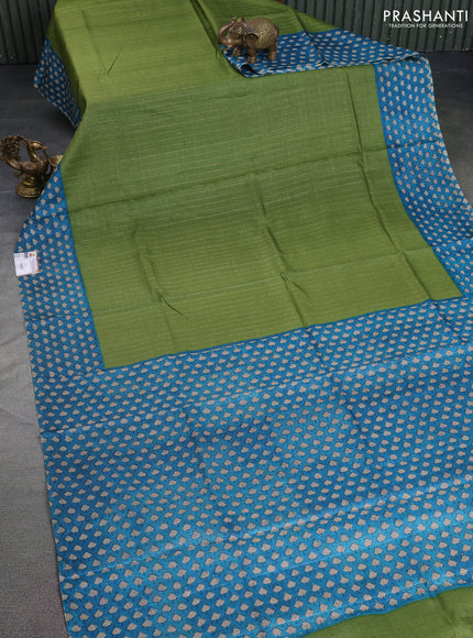 Pure tussar silk saree green and cs blue with allover zari checked pattern and printed border