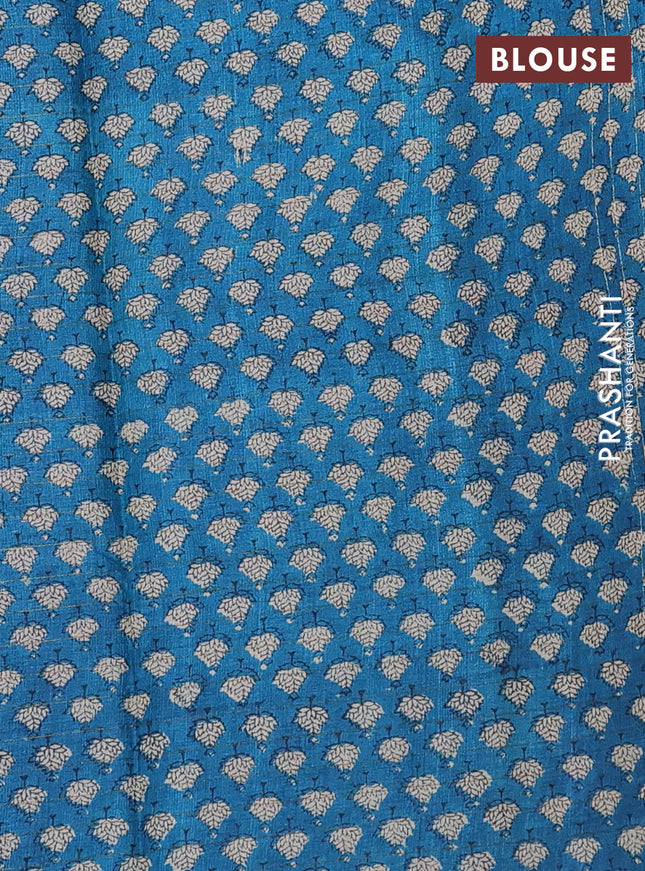Pure tussar silk saree green and cs blue with allover zari checked pattern and printed border