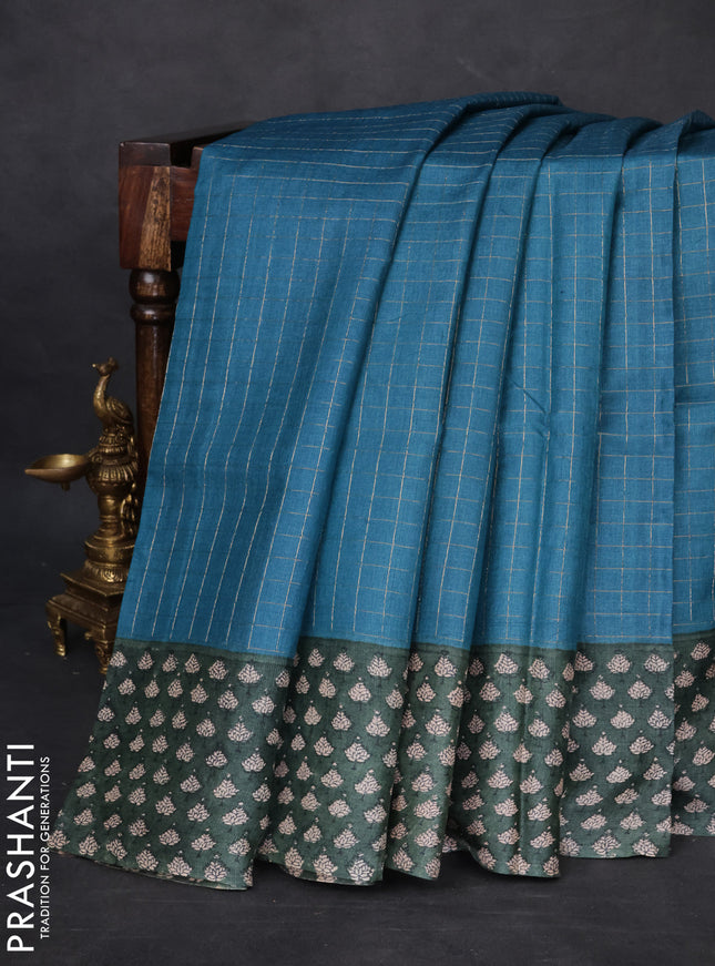 Pure tussar silk saree cs blue and dark green with allover zari checked pattern and printed border