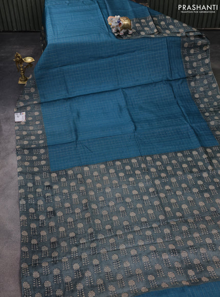 Pure tussar silk saree cs blue and grey with allover zari checked pattern and floral printed border