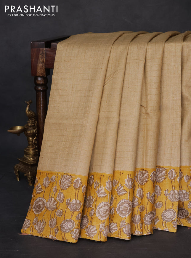 Pure tussar silk saree beige and yellow with allover zari checked pattern and kalamkari printed border