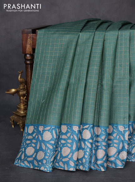Pure tussar silk saree green shade and cs blue with allover zari checked pattern and kalamkari printed border