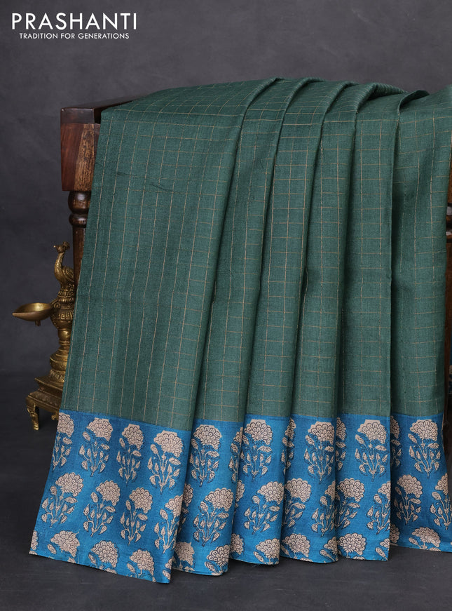 Pure tussar silk saree green and cs blue with allover zari checked pattern and floral printed butta border