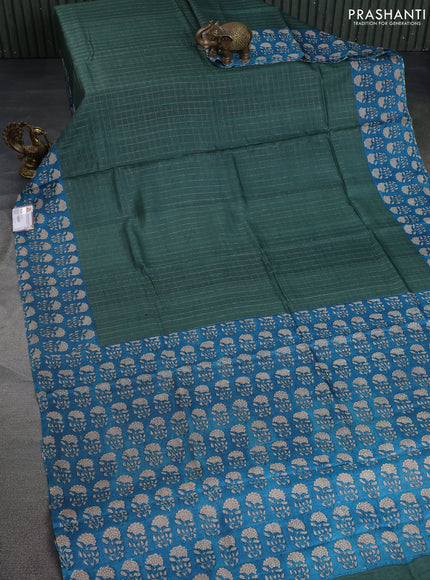 Pure tussar silk saree green and cs blue with allover zari checked pattern and floral printed butta border