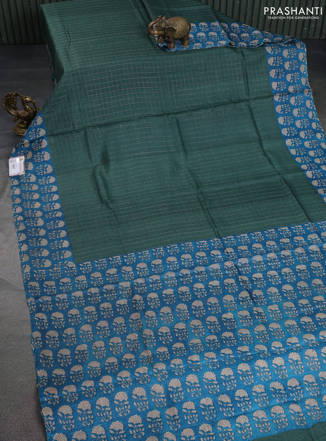 Pure tussar silk saree green and cs blue with allover zari checked pattern and floral printed butta border
