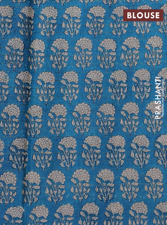 Pure tussar silk saree green and cs blue with allover zari checked pattern and floral printed butta border