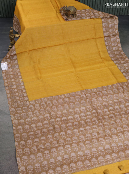 Pure tussar silk saree yellow and beige with allover zari checked pattern and floral printed butta border