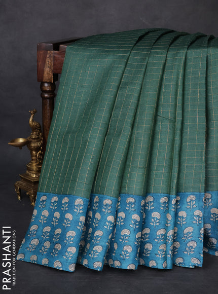 Pure tussar silk saree dark green and cs blue with allover zari checked pattern and floral printed border