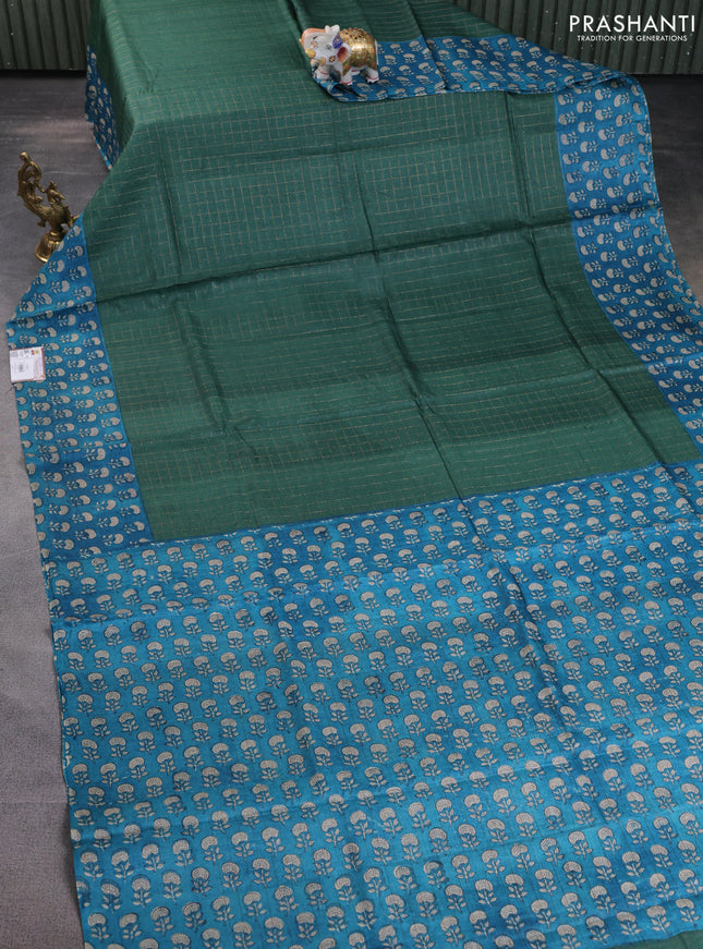 Pure tussar silk saree dark green and cs blue with allover zari checked pattern and floral printed border