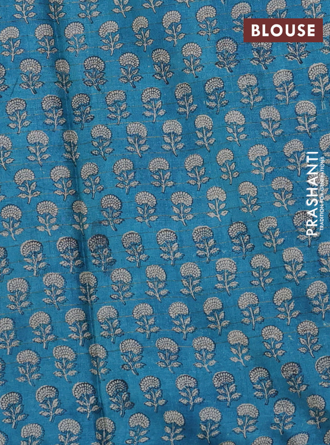 Pure tussar silk saree dark green and cs blue with allover zari checked pattern and floral printed border