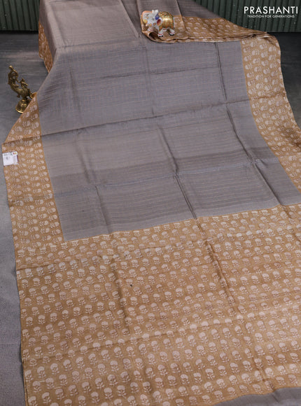 Pure tussar silk saree grey and sandal with allover zari checked pattern and floral printed border