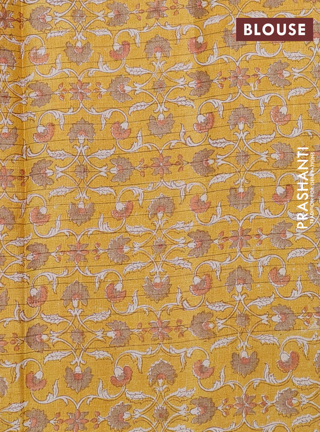 Pure tussar silk saree pale orange and mustard yellow with allover zari checked pattern and kalamkari printed border