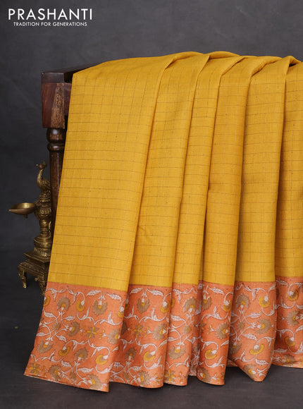 Pure tussar silk saree yellow and orange with allover zari checked pattern and kalamkari printed border