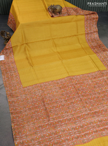 Pure tussar silk saree yellow and orange with allover zari checked pattern and kalamkari printed border