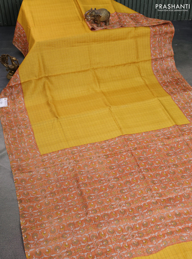 Pure tussar silk saree yellow and orange with allover zari checked pattern and kalamkari printed border