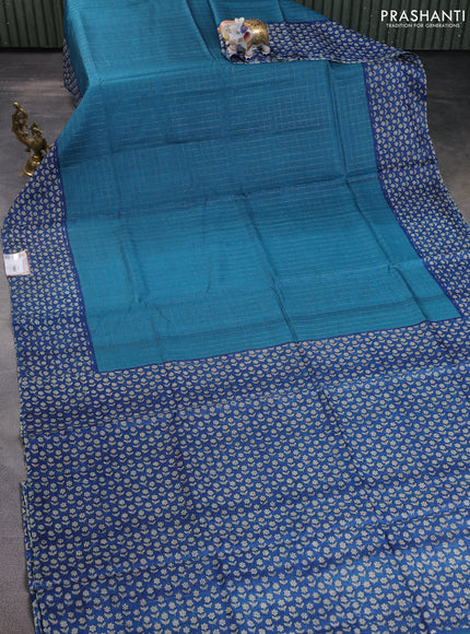 Pure tussar silk saree peacock blue and blue with allover zari checked pattern and floral printed border