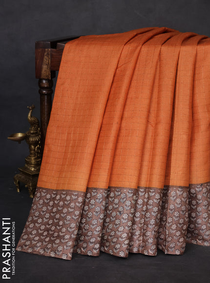 Pure tussar silk saree orange and brown with allover zari checked pattern and floral printed border