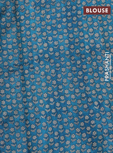 Pure tussar silk saree bottle green and cs blue with allover zari checked pattern and floral printed border