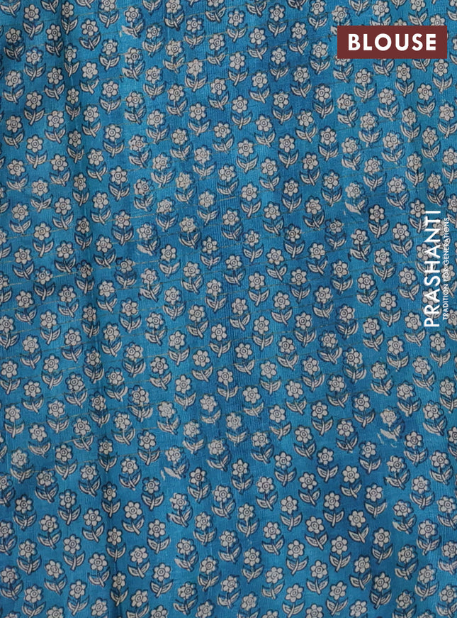 Pure tussar silk saree bottle green and cs blue with allover zari checked pattern and floral printed border