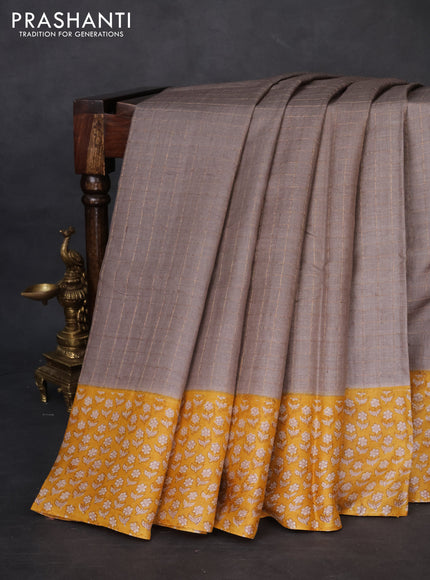 Pure tussar silk saree grey and mustard yellow with allover zari checked pattern and floral printed border