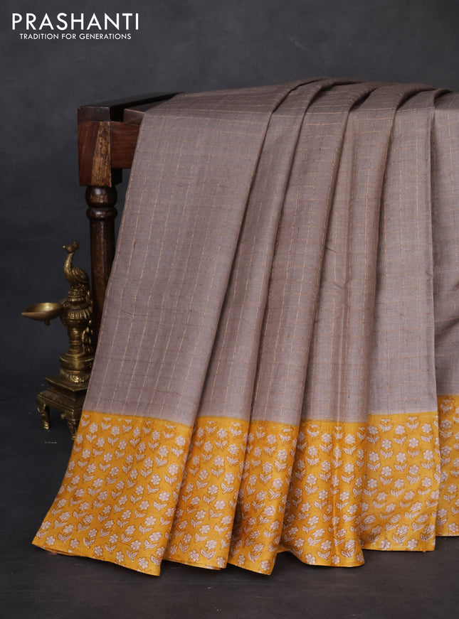 Pure tussar silk saree grey and mustard yellow with allover zari checked pattern and floral printed border