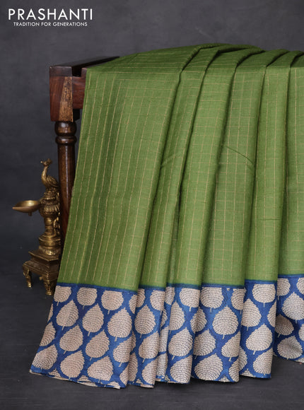 Pure tussar silk saree green and blue with allover zari checked pattern and printed butta border