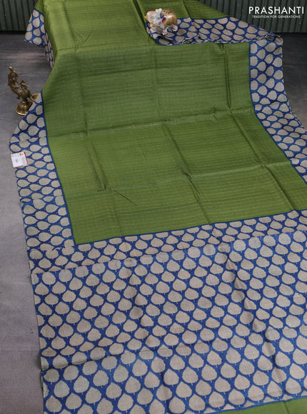 Pure tussar silk saree green and blue with allover zari checked pattern and printed butta border
