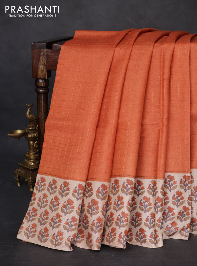 Pure tussar silk saree rust shade and beige with allover zari checked pattern and floral printed butta border
