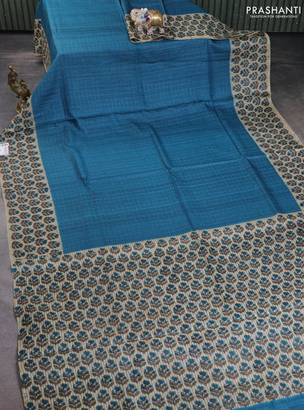 Pure tussar silk saree peacock blue and beige with allover zari checked pattern and floral printed butta border