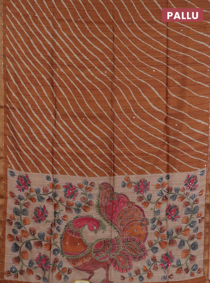 Semi tussar saree rust shade and beige with allover leheriya prints & zari buttas and kalamkari prints & pita work pallu