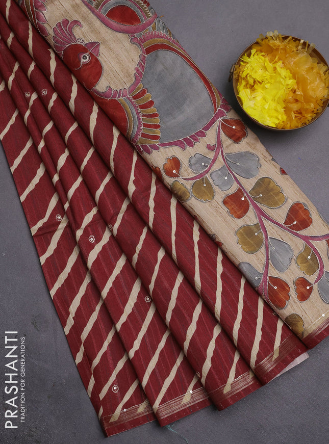 Semi tussar saree maroon and beige with allover leheriya prints & zari buttas and kalamkari prints & pita work pallu