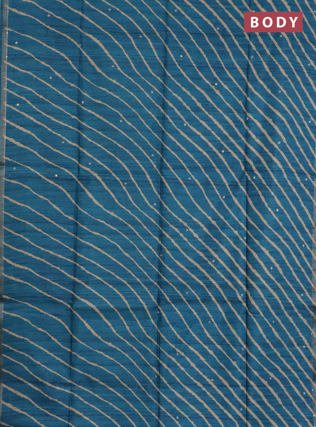 Semi tussar saree cs blue and beige with allover leheriya prints & zari buttas and kalamkari prints & pita work pallu