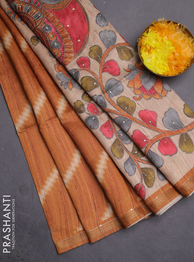 Semi tussar saree rustic orange and beige with allover leheriya prints & zari buttas and kalamkari prints & pita work pallu