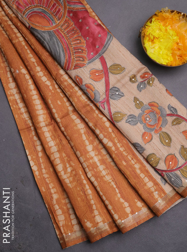 Semi tussar saree dark mustard and beige with allover tie & dye prints and kalamkari prints & pita work pallu