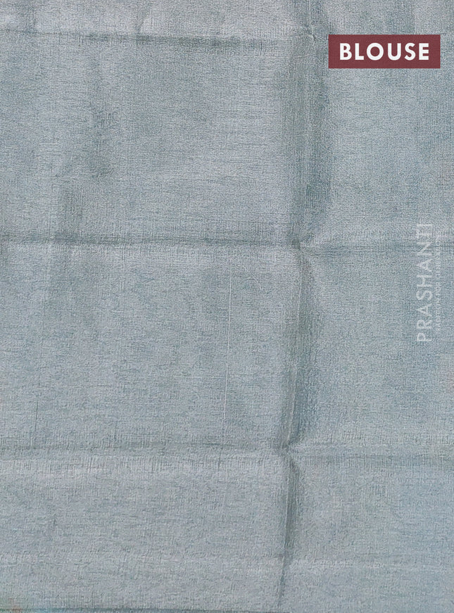 Pure uppada silk saree dual shade of teal blue with silver zari woven floral buttas and silver zari woven border