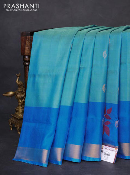 Pure uppada silk saree teal blue and cs blue with silver & gold zari woven buttas and paisley design zari woven border