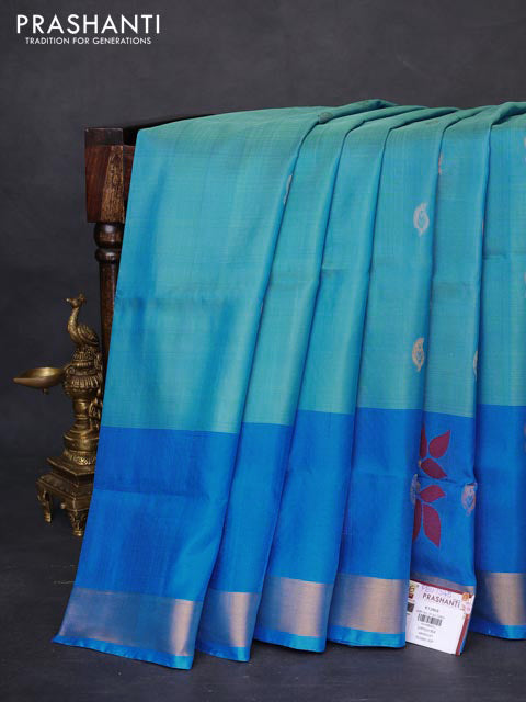 Pure uppada silk saree teal blue and cs blue with silver & gold zari woven buttas and paisley design zari woven border